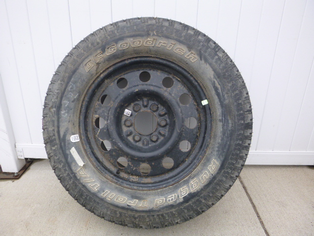 lot 24 image: BF Goodrich Rugged Trail Tire with 6 Hole Rim