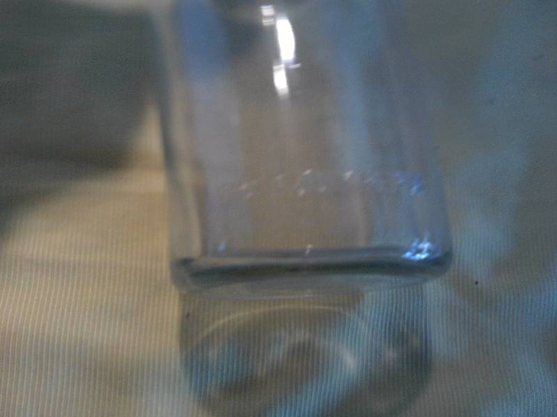 ANTIQUE JAR WITH GLASS TOP