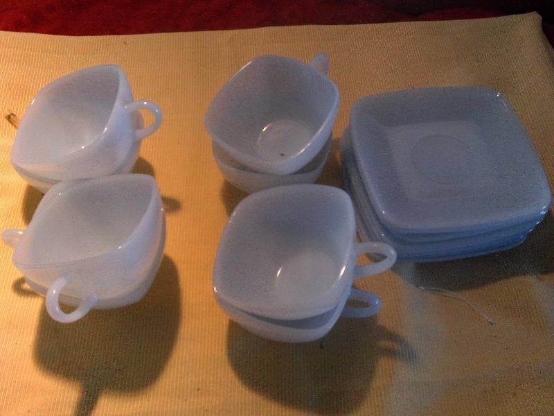 8 SAUCERS AND CUPS
