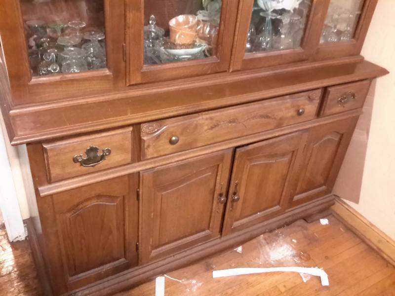 China Hutch.. Looks like Maple wood.. Has light.. 2 part