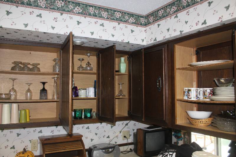 lot 257 image: Top 5 Cabinet Contents Including Glassware Ceramics Plates Mugs Cups Trays