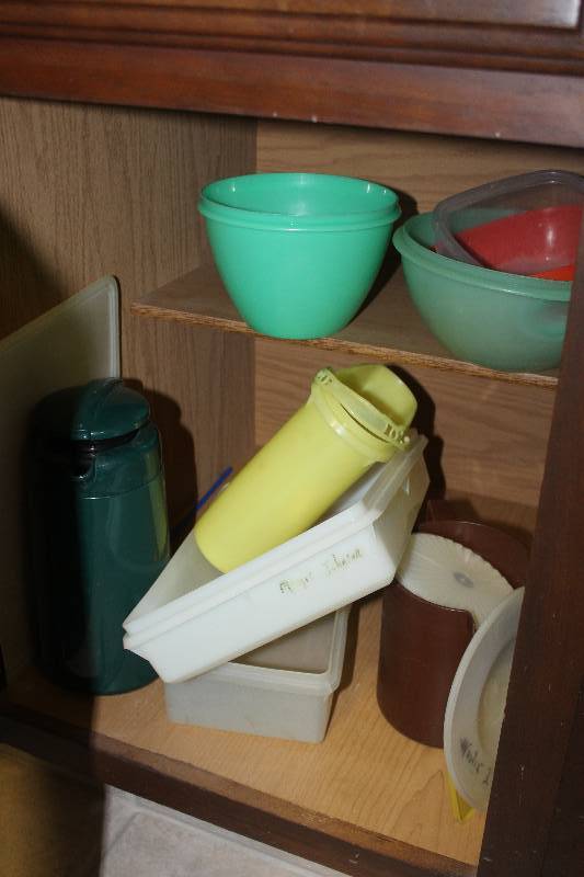 lot 256 image: Lower Cabinet Contents Including Tupperware Kitchen Utensils