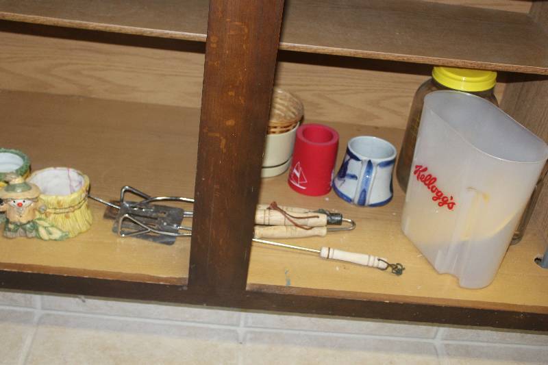 lot 258 image: Lower Cabinet Contents Including Decorations Kitchen Tools Baskets Mug
