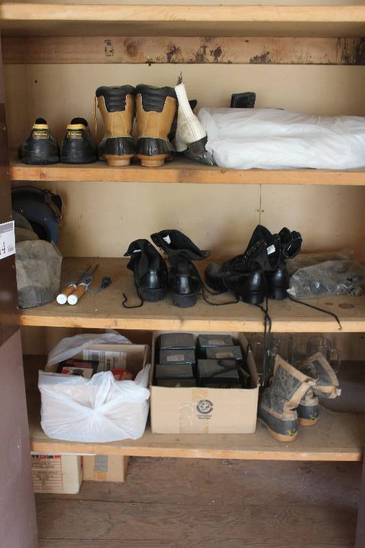 lot 314 image: Contents Including Shoes Boots Helmets And More