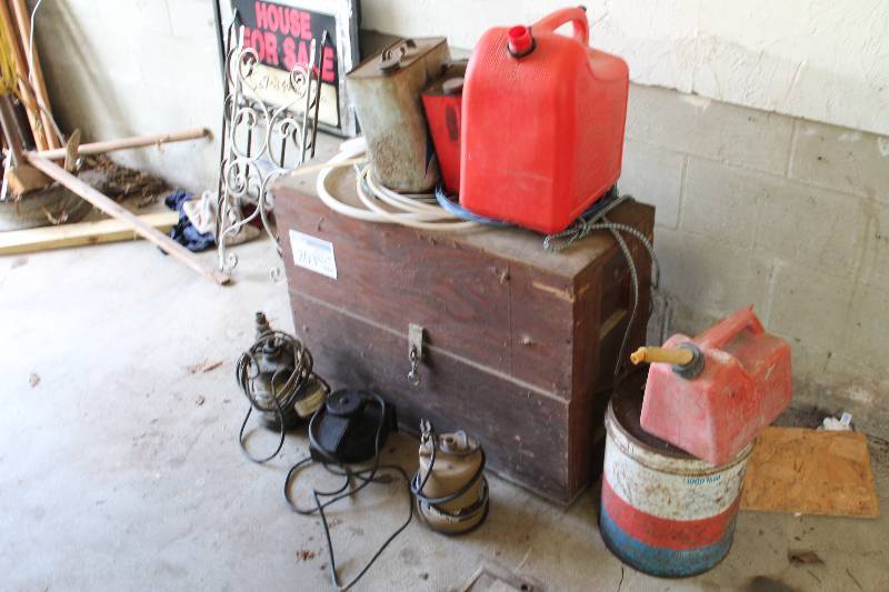lot 203 image: Pile Lot Including Gas Cans Wood Chest Pumps