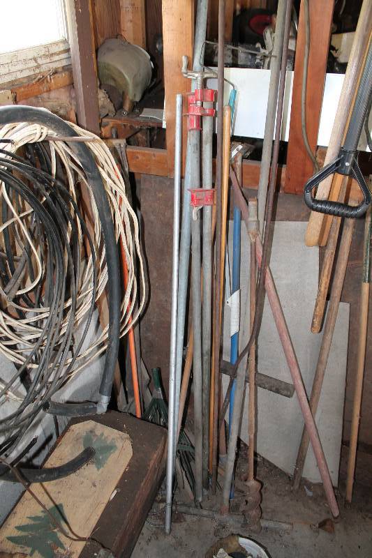 lot 172 image: Corner Pile Lot of Tools Including Pipe Vise Auger Tree Saw And More