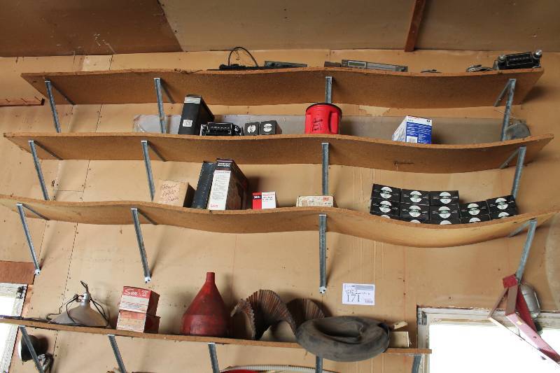 lot 171 image: Contents of Shelves Above Lots 169, 170 Including Lights Chain Saw Sharpener Gas Can Car Stereos