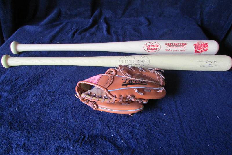 lot 97 image: Twins 2 Bats & Glove