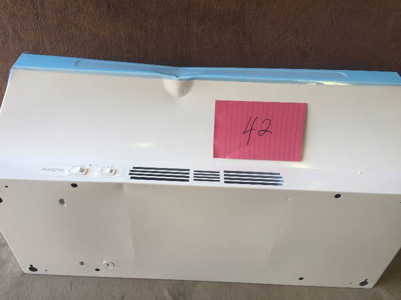 lot 42 image: NuTone RL6200 30 in. Non-Vented Range Hood in White dented please review pictures