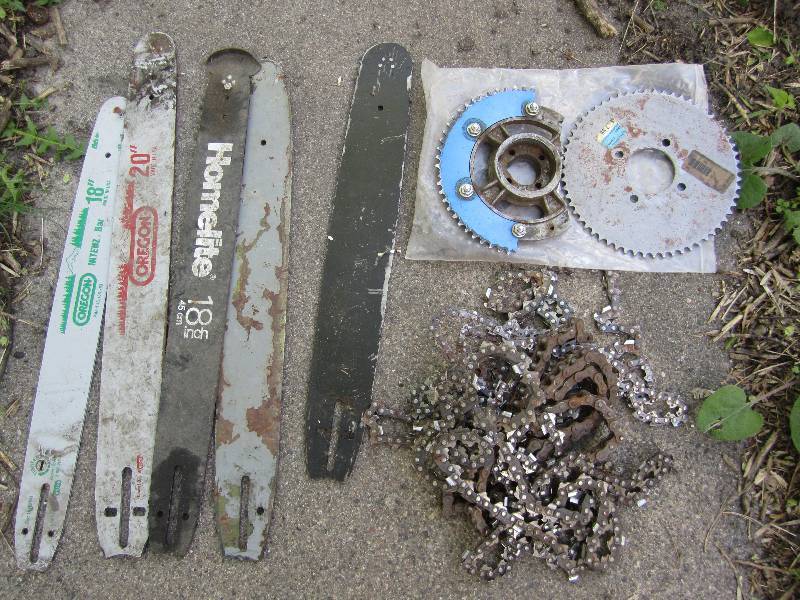 lot 114 image: Chain saw bars, chain and gear...