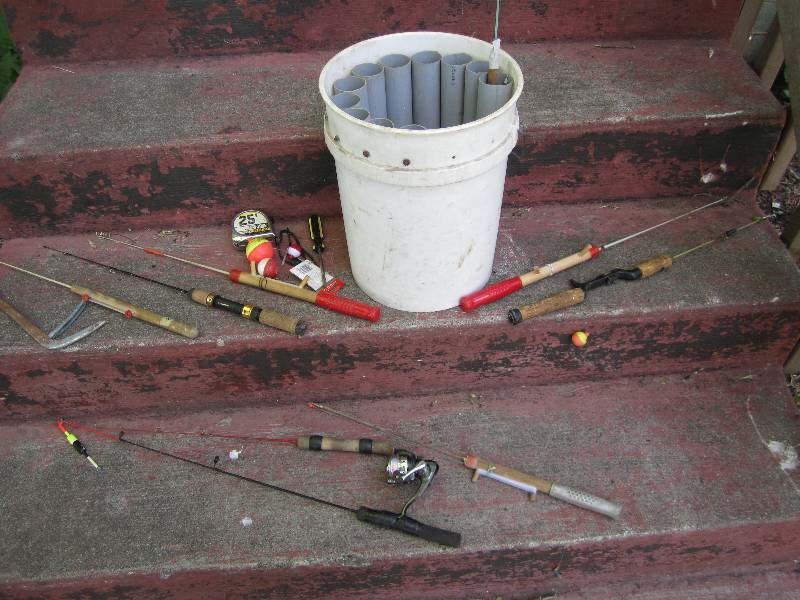 lot 117 image: Bucket with pole holders and assort...