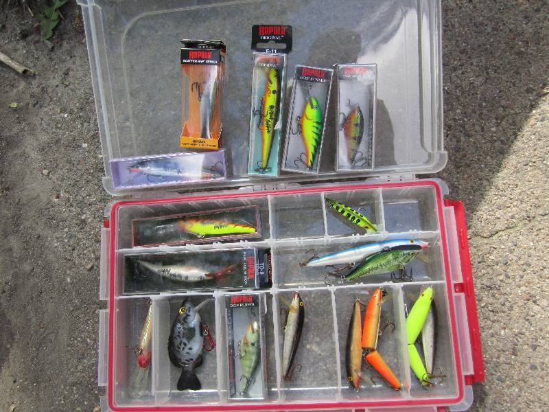 lot 126 image: Waterproof box with assorted Rapala...