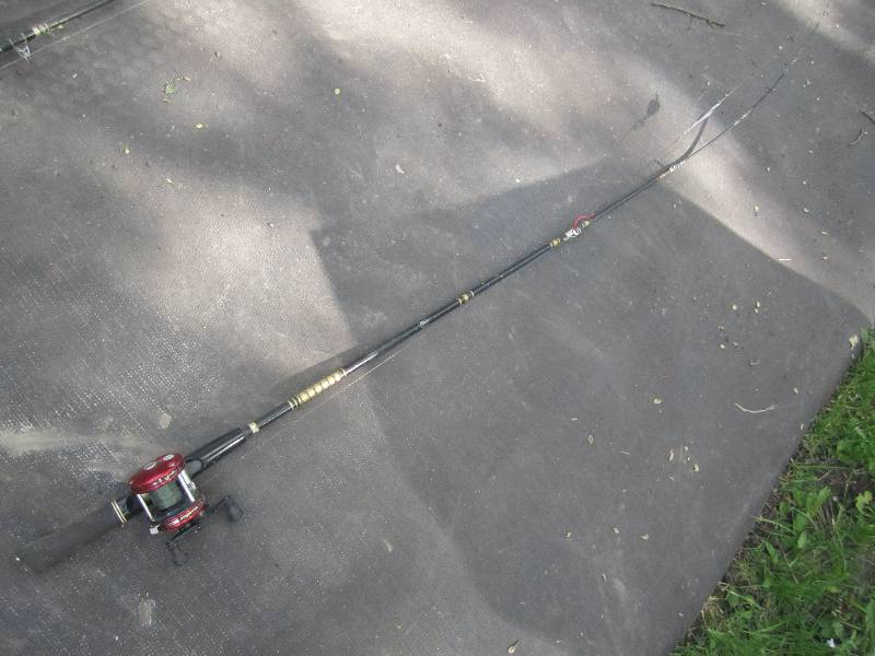 lot 135 image: Rod and reel...