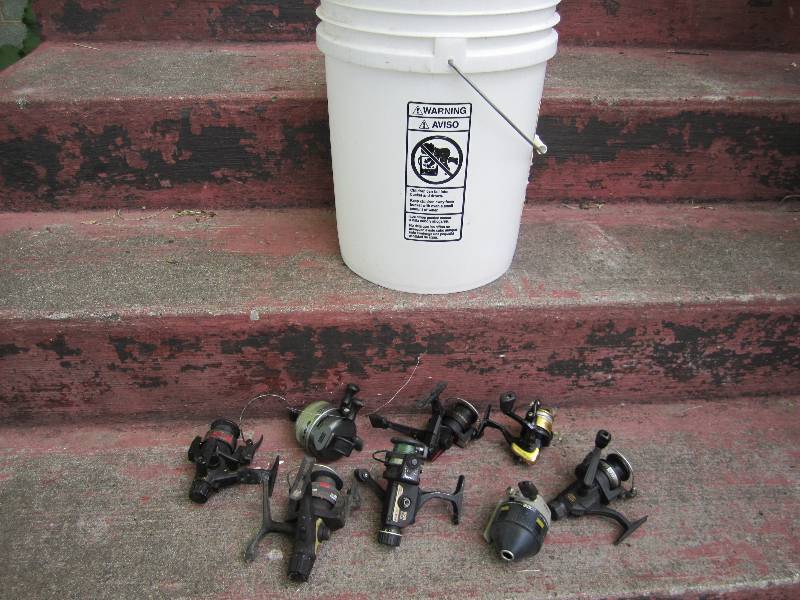 lot 150 image: Bucket of assorted fishing reels...