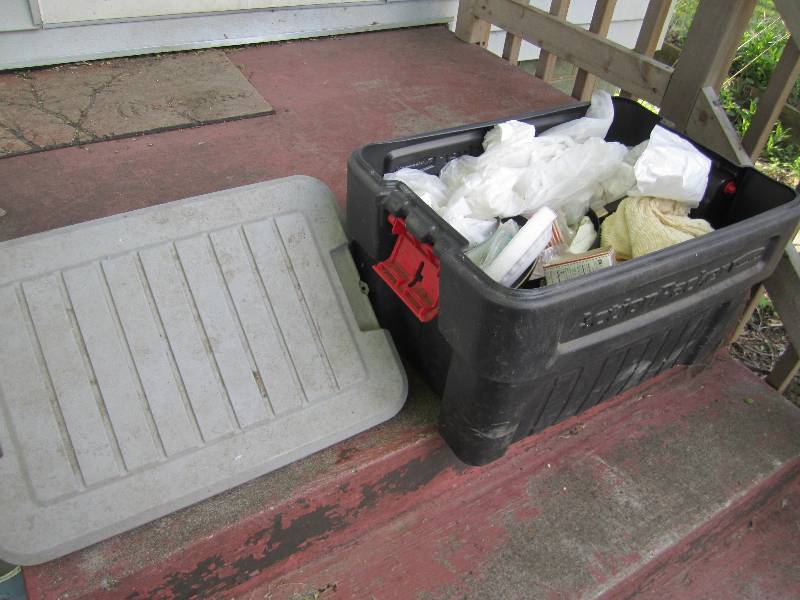 lot 159 image: Action packer plastic tote of assor...