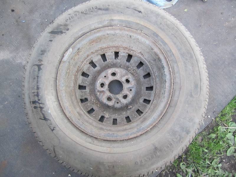 lot 180 image: P18580 R13 tire on rim, great trea...