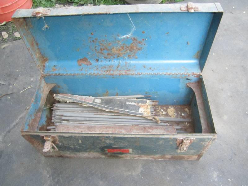 lot 183 image: Tool box filled with welding rods...