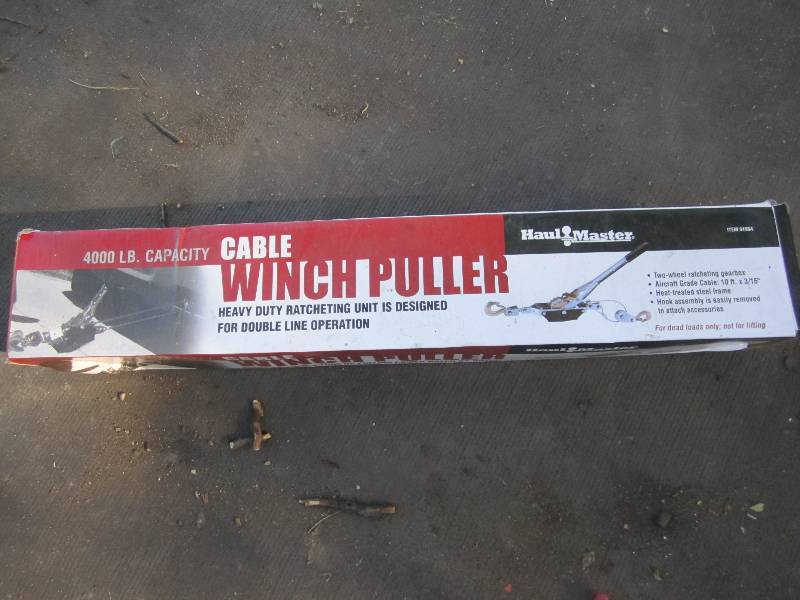 lot 219 image: 4000 Lb cable winch puller...