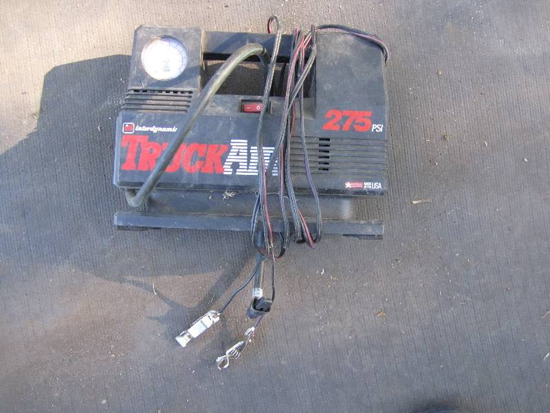 lot 225 image: 275 Lb battery air compressor...