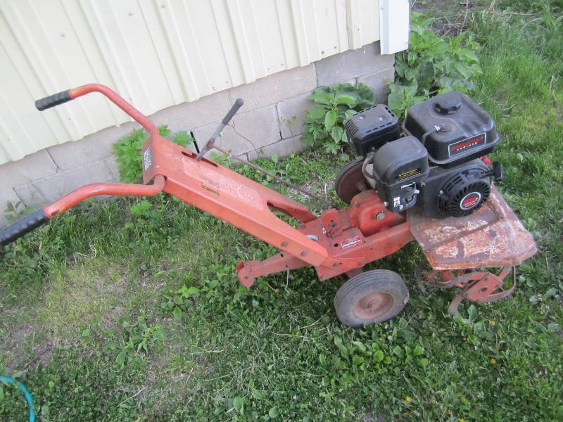 lot 274 image: Front tine tiller, engine looks new...