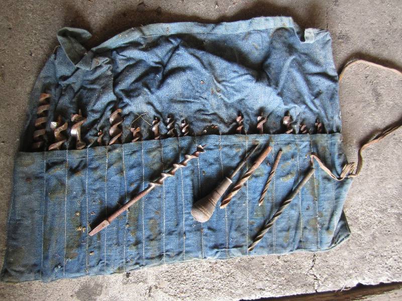 lot 296 image: Set of drill bits in denim holder...