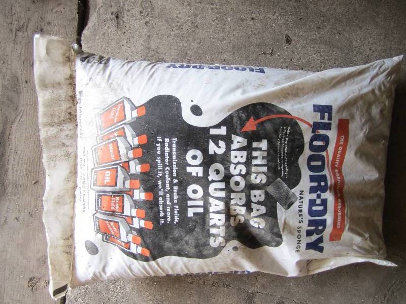 lot 300 image: Floor dry oil absorber, unopened ba...