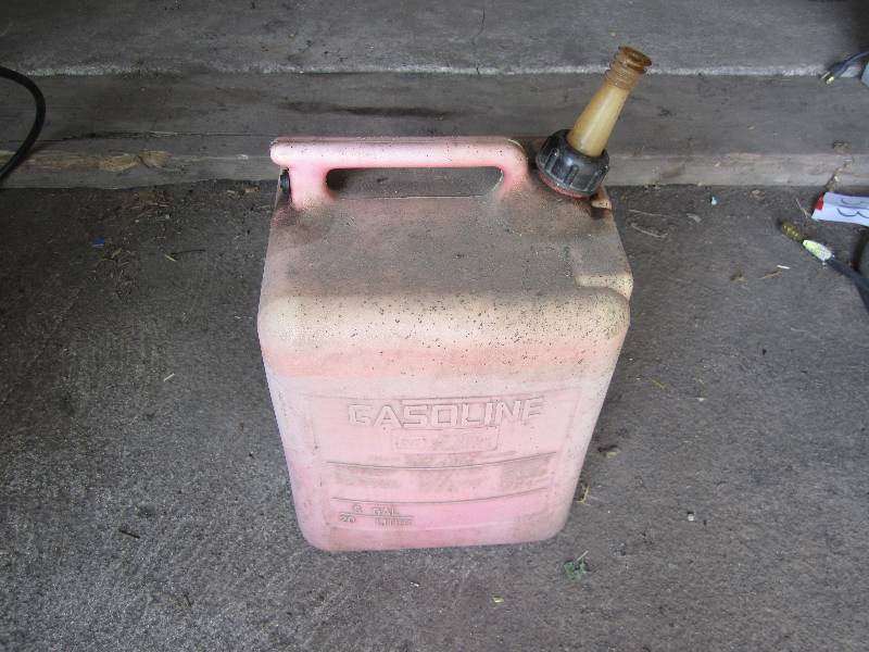 lot 314 image: Gas can, appears to be filled with ...