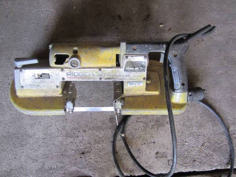 lot 321 image: Rigid portable band saw, cord is fr...