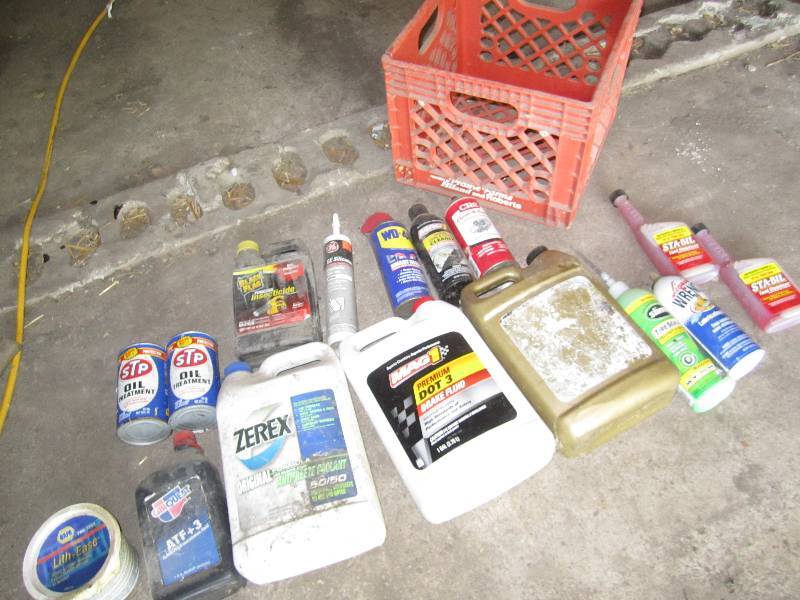 lot 342 image: Lot of automotive fluids, most are ...