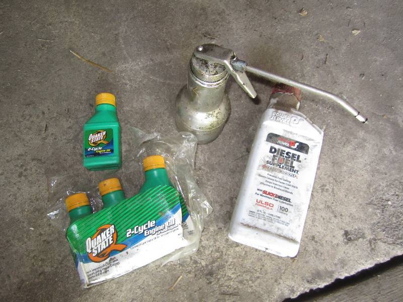 lot 356 image: Oil can diesel supplement and 2 cyc...