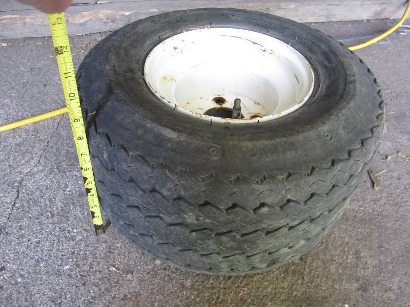lot 357 image: Lawn mower tire...