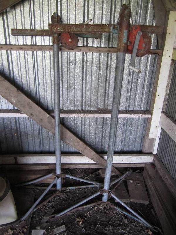 lot 377 image: 2 Griswold winch hoists on stands...