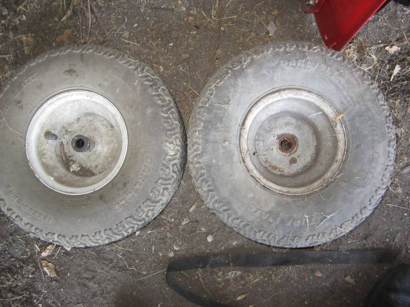 lot 391 image: Pair of lawn mower tires...