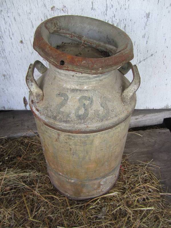 lot 406 image: Milk can with lid...
