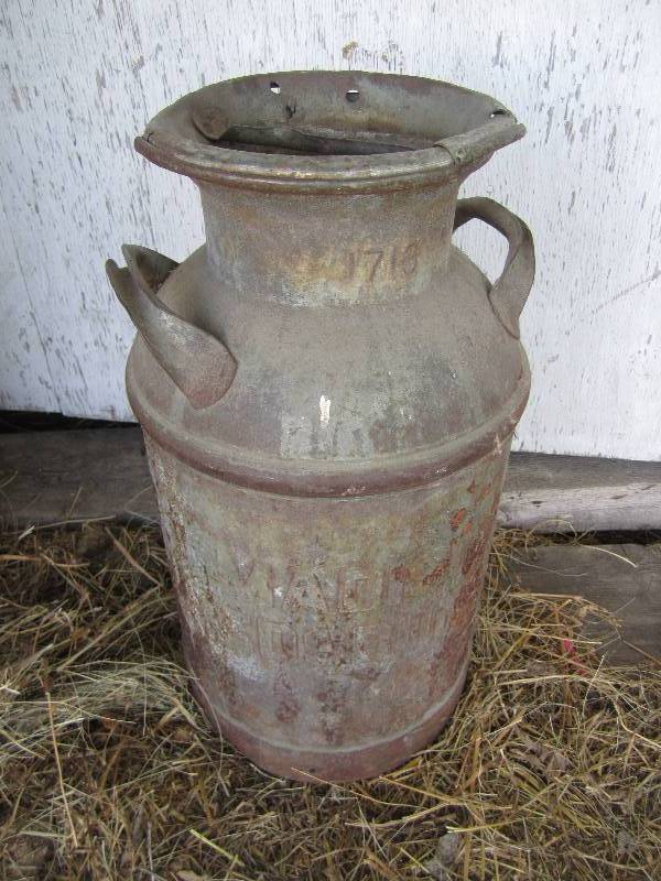 lot 407 image: Milk can with lid...