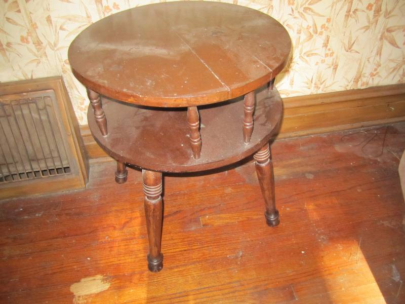 lot 28 image: End table 19 across...