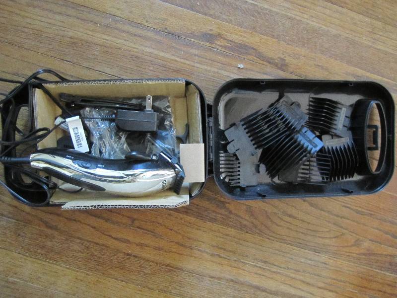 lot 31 image: Conair clipper with attachments...