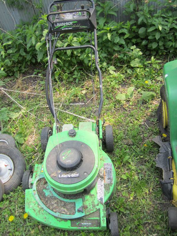 lot 600 image: Lawn Boy push mower, not working, f...