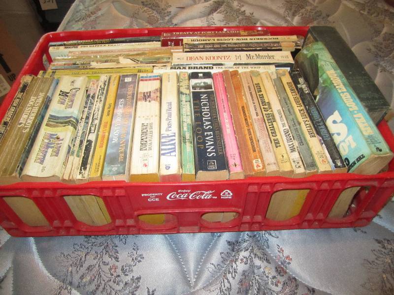 lot 583 image: Plastic Coca Cola Box of paperback ...