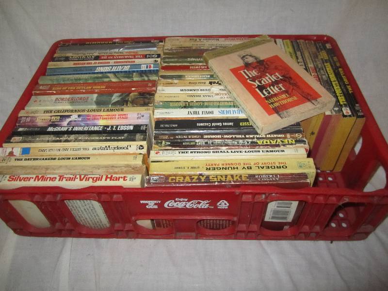 lot 655 image: Coca Cola bin of Western books...