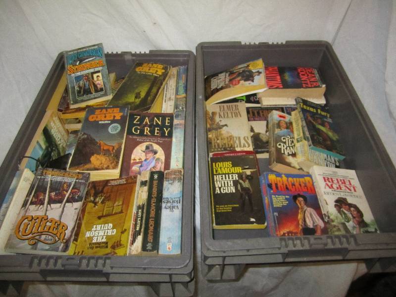 lot 659 image: 2 plastic crates of paperbacks...