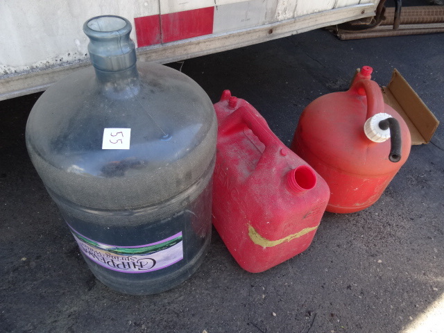 lot 55 image: Gas Cans & Water Jug