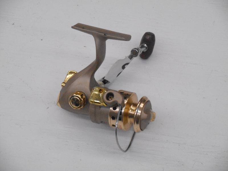 lot 97 image: HT Light Action Spinning Reel ...