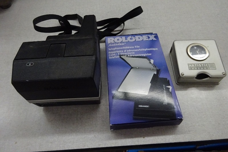 lot 167 image: Clock, rolodex, Polorois Sun600 Camera