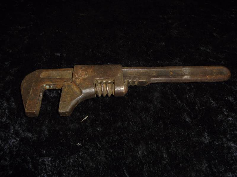 lot 7 image: Vintage John Deere Monkey Wrench