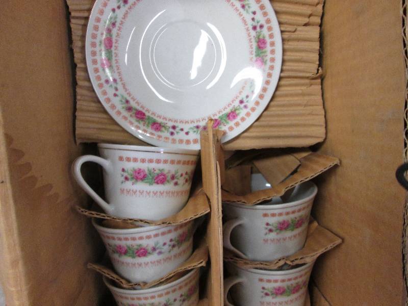 Set of 5 cups and 4 saucers...
