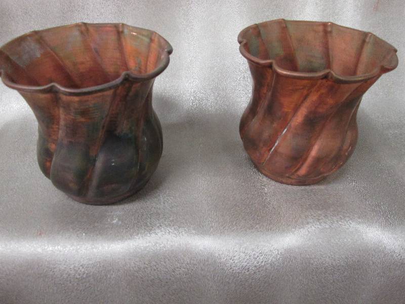 Lot of 2 copper colored metal vases...