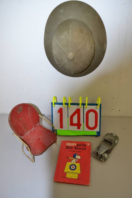 Toys, book and helmet