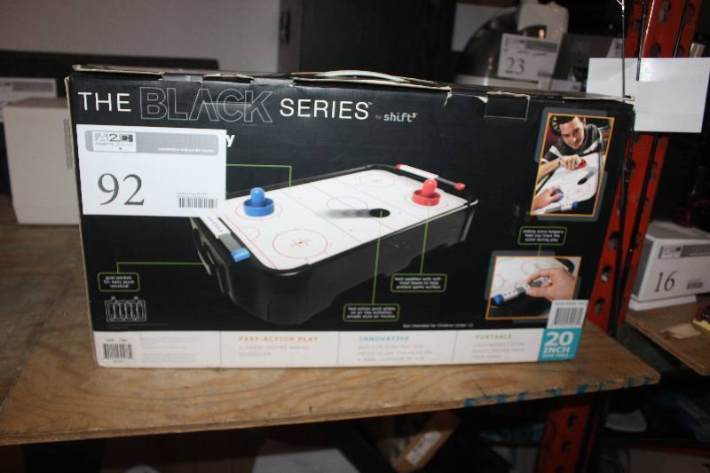 lot 92 image: The Black Series Miniature Air Hockey Table