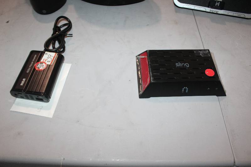 lot 95 image: Lot of (2) Electronics Including 1) Slingbox Sling Media AND 1) RCA 150W Power Inverter